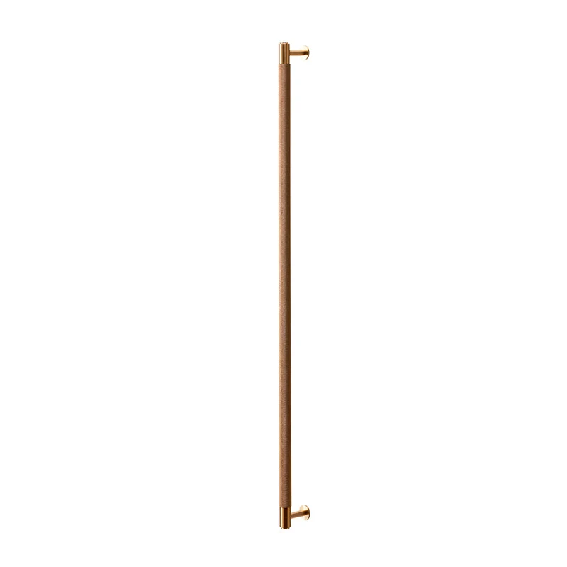 Cross dubbelsidigt dörrhandtag i massiv mässing med diamantslipat mönster 774 mm • Buster + Punch
